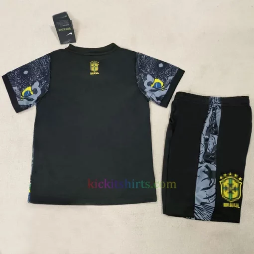 Brazil Christ the Redeemer kids' shirt in black with center pattern, yellow logos, and Brazilian flag near the crest.