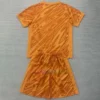 Chelsea Goalkeeper Kit Kids 202425 Orange in bright orange with official club logo, featuring breathable, moisture-wicking fabric for comfort and flexibility.
