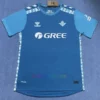 Real Betis Third Shirt 2024/25 with Seville landmarks design and blue tones.